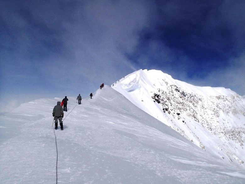 Climbers in Line to Summit the Mountain