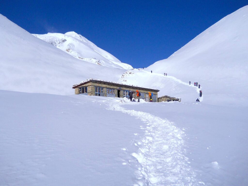 Way of Thorong La Pass - Group of People crossing Annapurna Circuit
