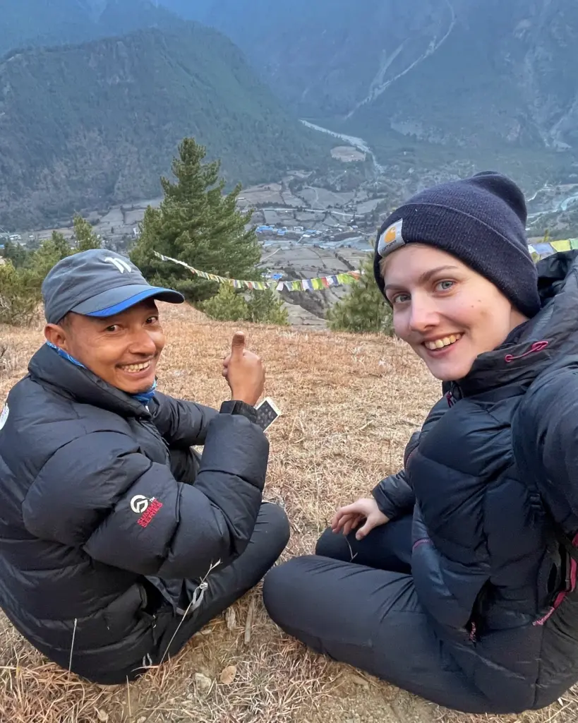 Our guide Bam with Solo female traveler trekking in Annapurna Circuit Trek
