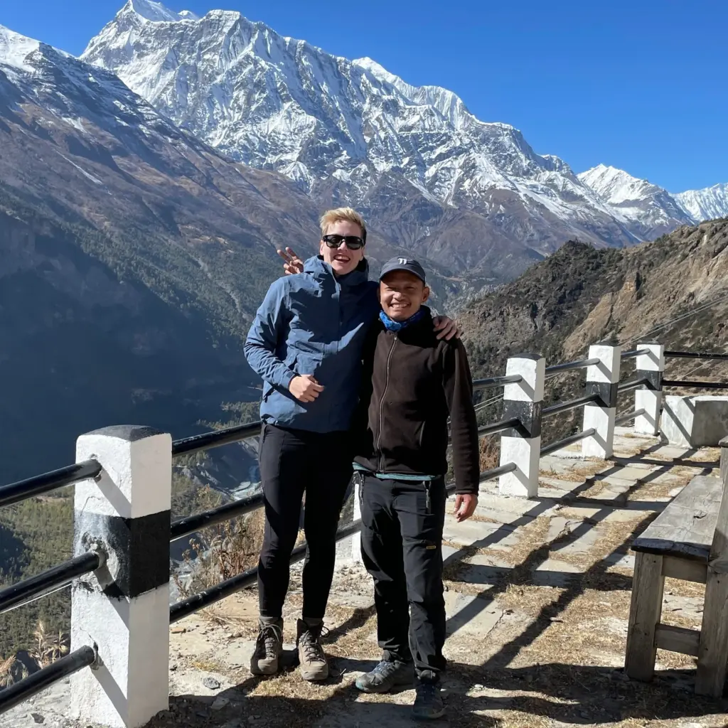 Happy solo female trekking in Nepal with Hi Nepal Travels and Treks